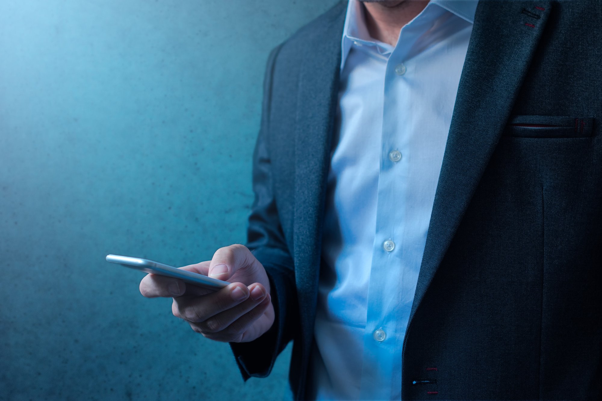 handsome-businessman-in-modern-business-suit-PQTQG7X
